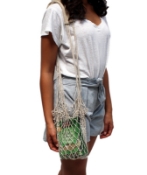 lady carrying products in the hemp twine net shopper bag