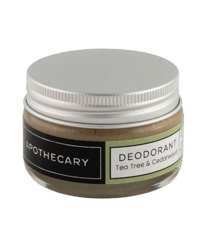 	Glass jar containing The Apothecary brand natural deodorant in tea tree and cedarwood scent